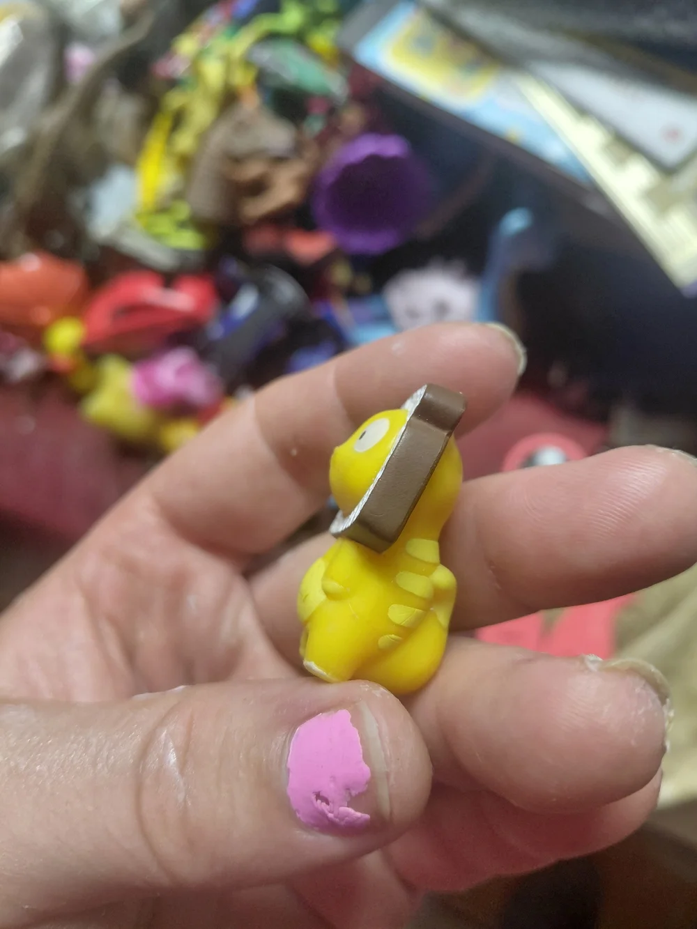 figurine is Loafy, a character from the collectible Hasbro Lost Kitties Series 1